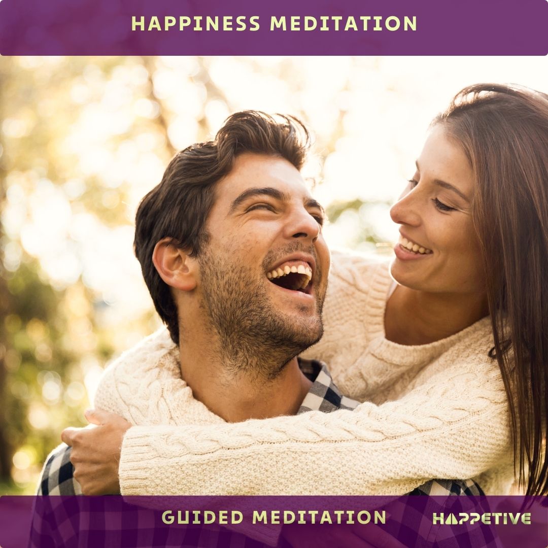 Happy couple in the park looking at each other and laughing showing Happiness Meditation of Happetive